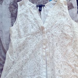 INC sleeveless white blouse. Lace front with a slightly sheer back.